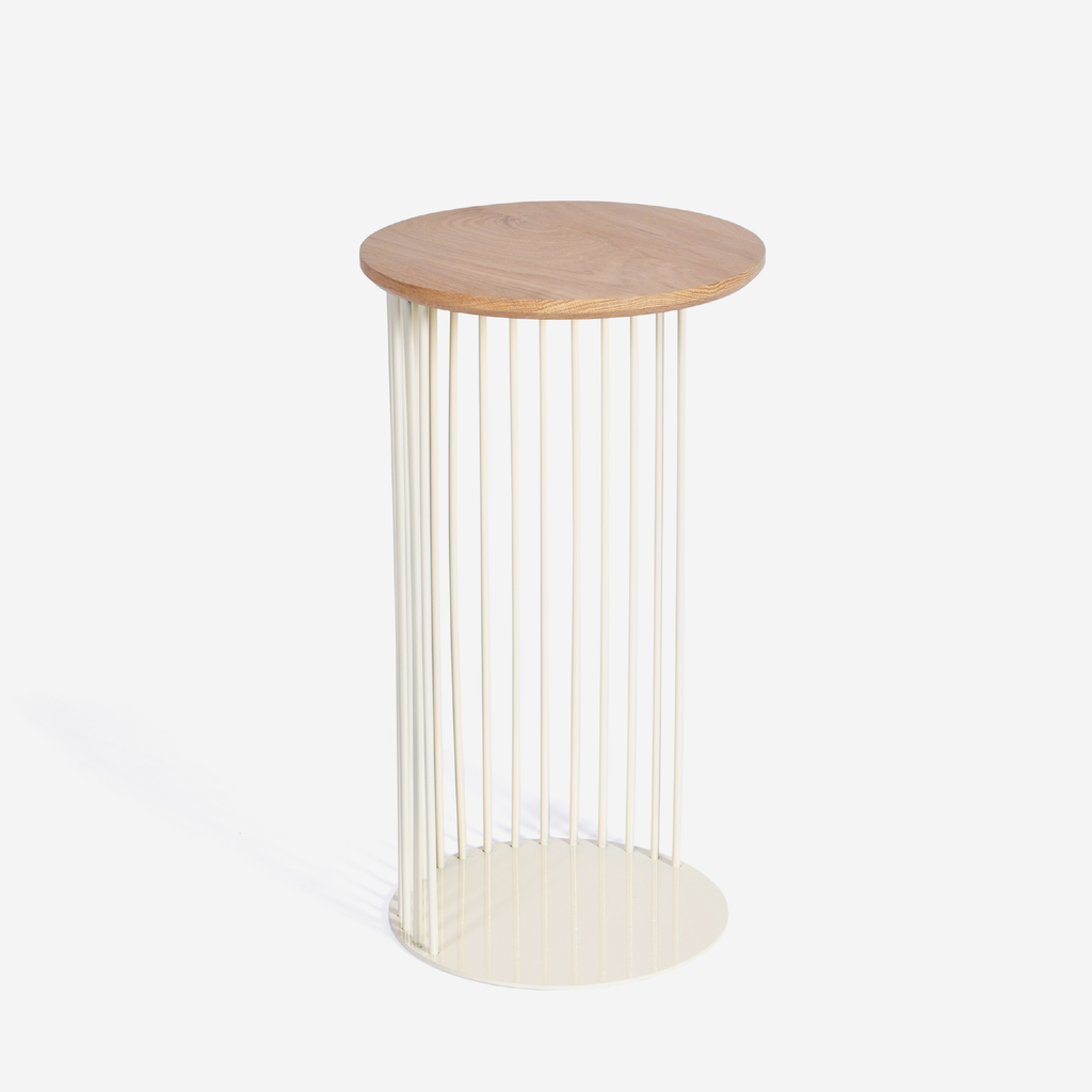 An end table in cream with an oak table top on a white background